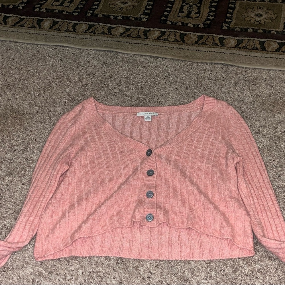 A pink sweater! Good for any type of weather! Light on the skin! Super soft!!!!!